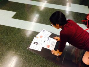 Karen Su working on the JSA board for the club fair.  Photo by Suswana Chowdhury