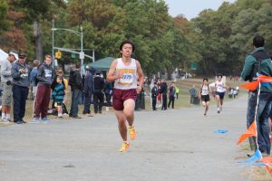 Senior Brian Van races to the finish line in the Junior Varsity 5k. Photo by Yash Sharma