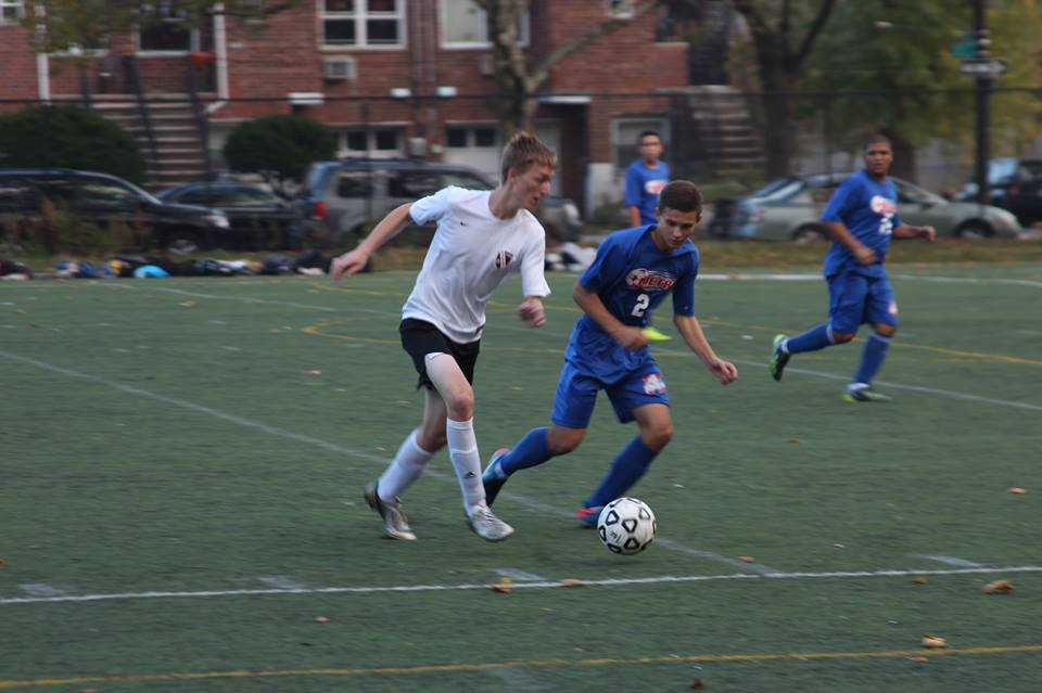 Senior Michael Jazgarski take on a defender. Photo taken by: Diana Itzhaki