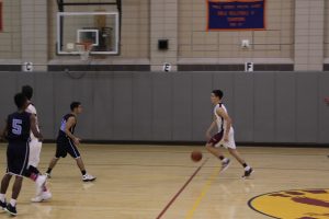 Junior Milan Majstorovic brings the ball up the court. Photo Credit: Reon Chang.