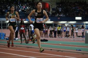 Senior indoor co-captain Stephanie Loo dashes to the finish line. Photo Credit: Yash Sharma