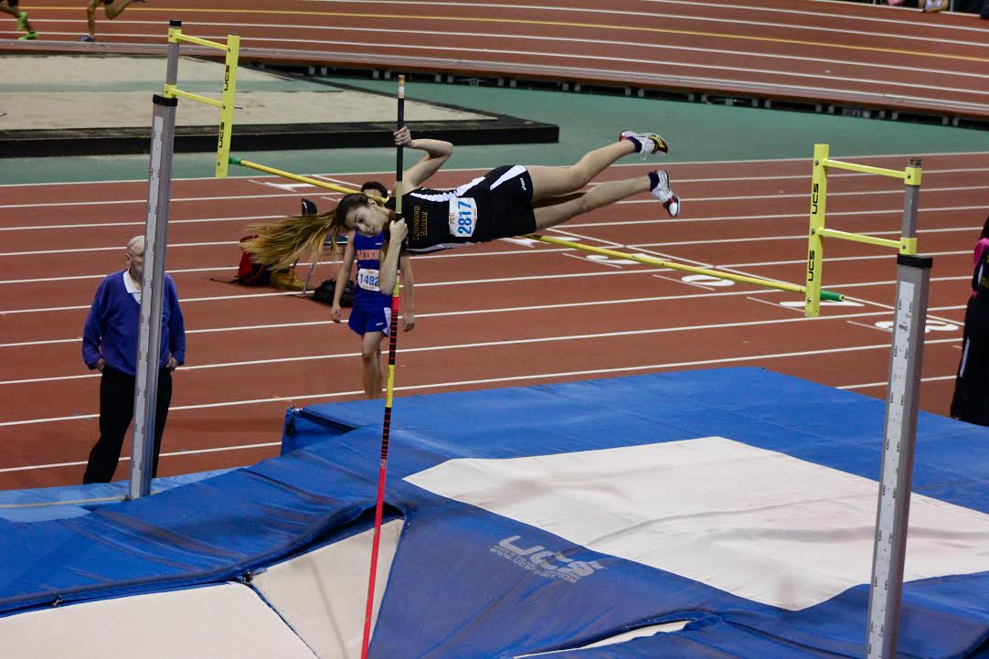 Sophomore Kellie Zestanakis places third in the varsity pole vault. Photo Credit: Jackson Loo.