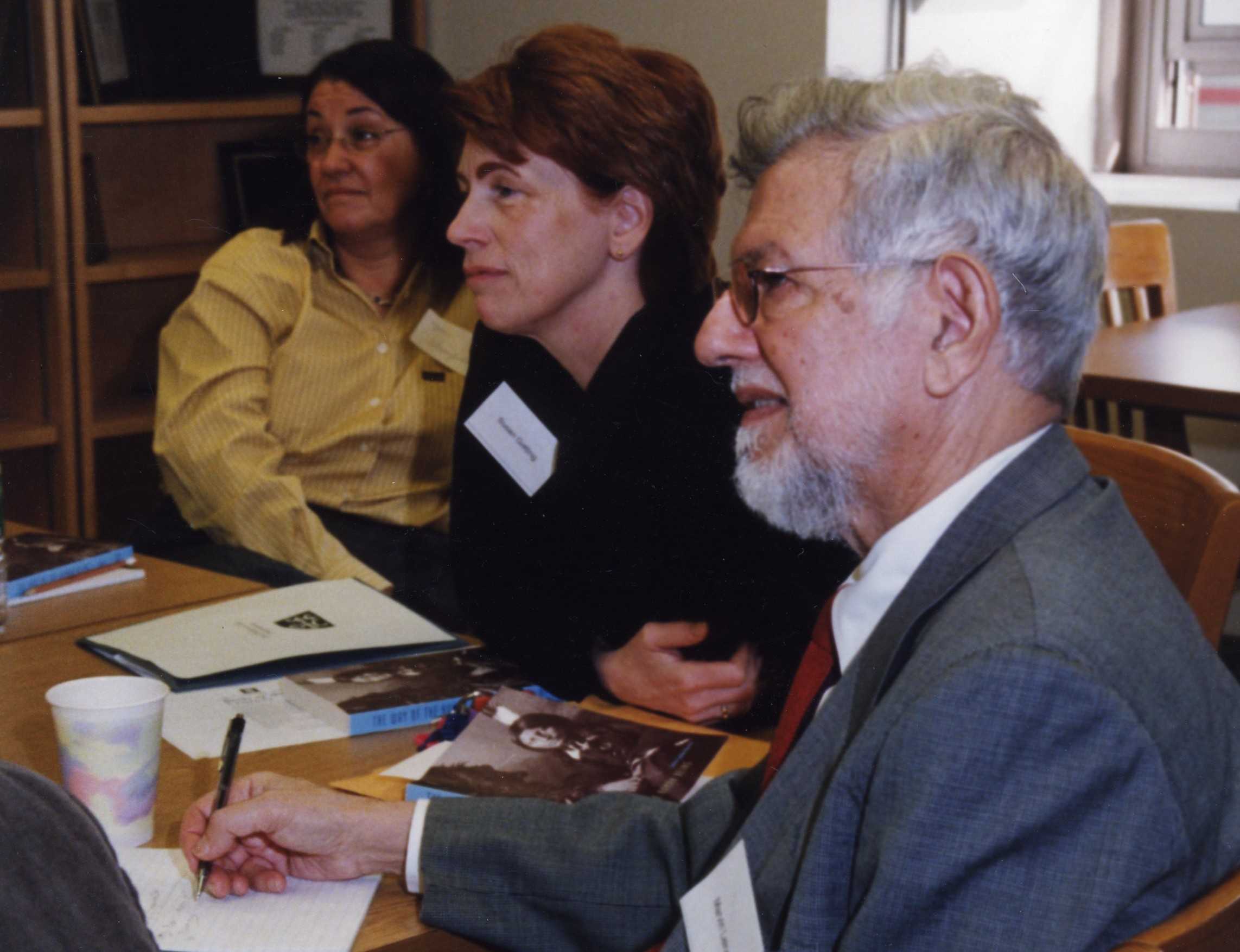 Dr. Leiner at a meeting in the principal’s conference room.